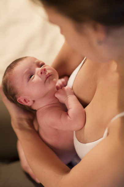 the newborn on hands at mother - Fotoğraf, Görsel