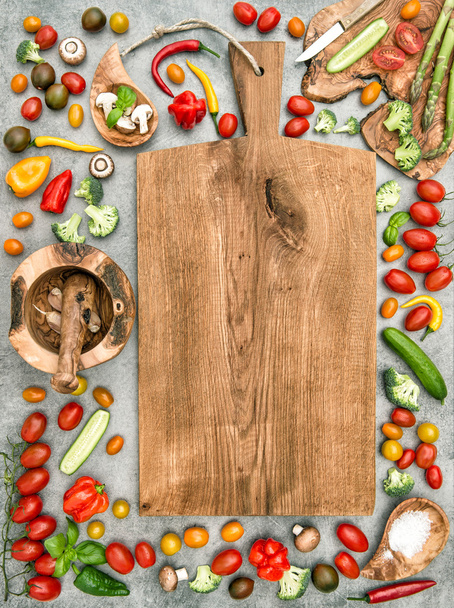 Fresh vegetables wooden cutting board kitchen table - Photo, Image