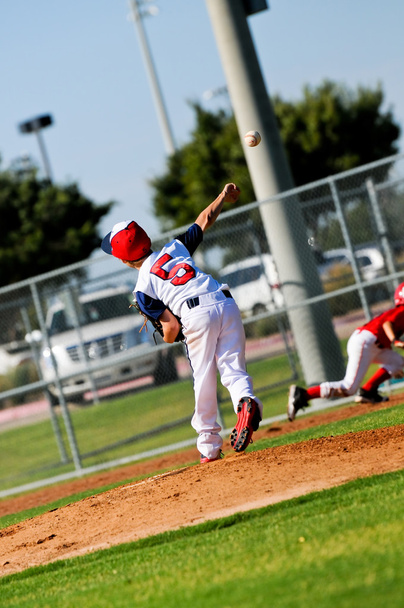 Little league pitcher throwing to first - Photo, Image