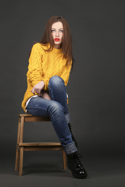 Lovely girl in a yellow with gorgeous hair, red lips - Zdjęcie, obraz