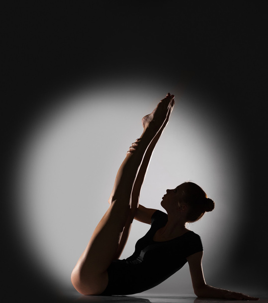 Gymnastics exercise in the studio - Zdjęcie, obraz