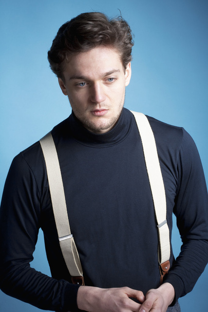 Young Man with Suspenders. - 写真・画像
