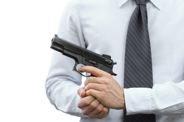 Επιθετική επιχειρηματία με ένα πυροβόλο όπλο - Φωτογραφία, εικόνα
