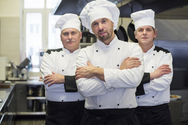 Команда поваров на кухне
  - Фото, изображение