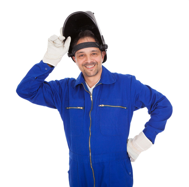 Portrait of confident welder in the mask - Foto, imagen