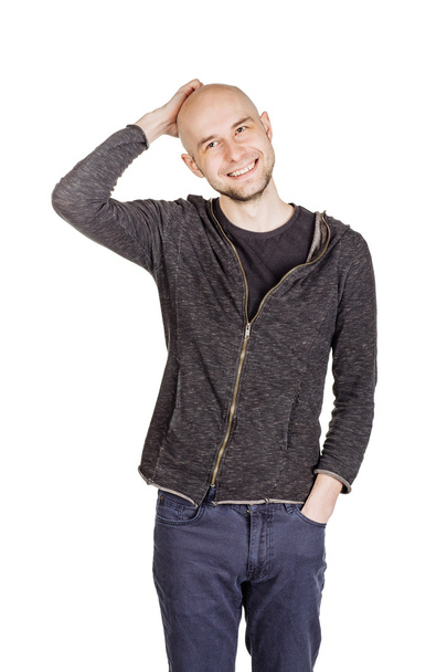 Young man wearing hoody and jeans   - Foto, afbeelding