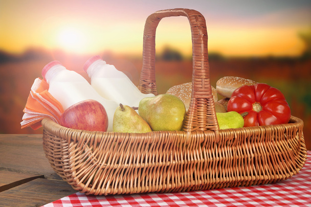 Picnic Basket With Food And Drink On The Table - Photo, Image