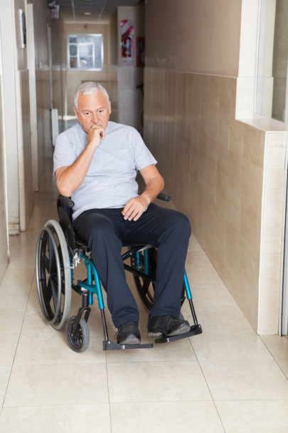 Sad Senior Man Sitting In a Wheelchair - Photo, Image