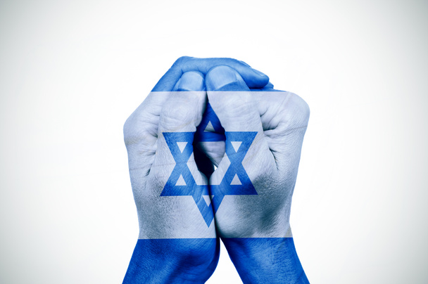hands patterned with the flag of Israel - Photo, Image