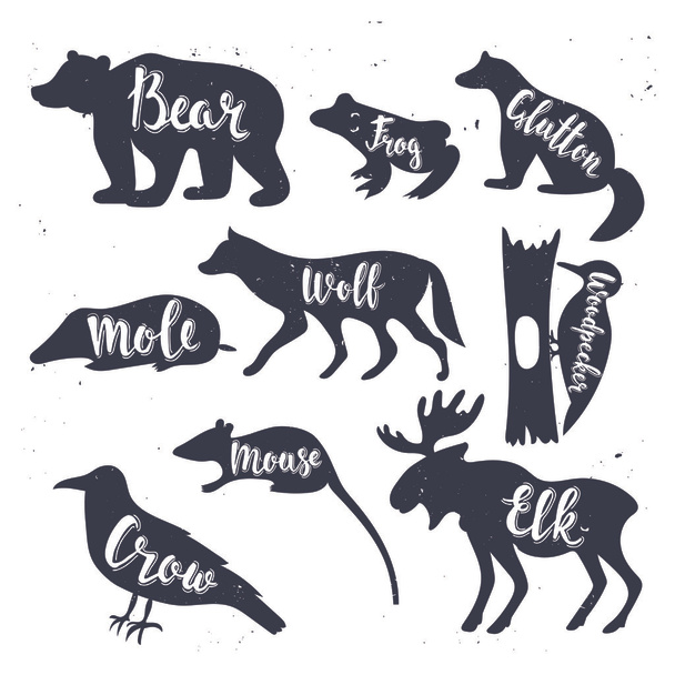 Wild animals isolated silhouettes with lettering - Vektor, Bild