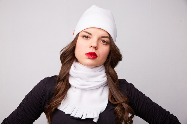 portrait of a girl in a white hat and scarf - Photo, Image