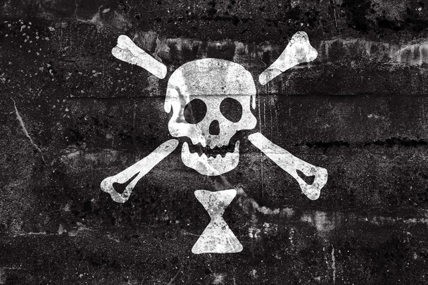 Emanuel Wynn Pirate Flag, painted on dirty wall. Vintage and old look. - Photo, image