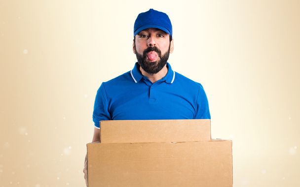 Delivery man doing a joke - Photo, Image