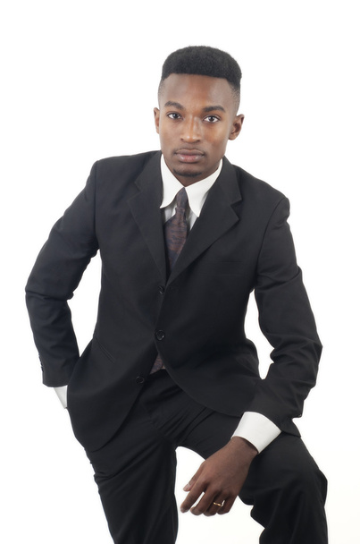 άνθρωπος των νέων επιχειρήσεων σε άσπρο φόντο κοστούμι και γραβάτα - Φωτογραφία, εικόνα