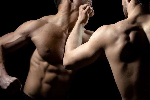 Young muscular men boxing - Fotó, kép