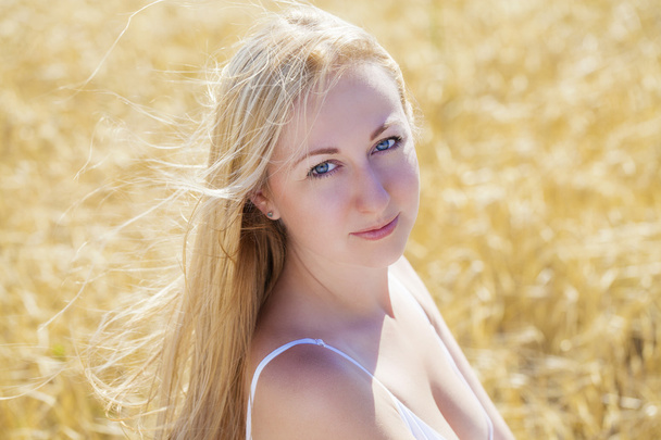 Beautiful young blonde woman  - Фото, зображення