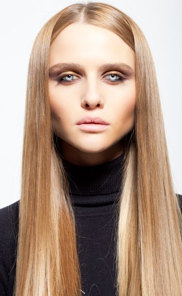 Beauty portrait of blond girl with smoky eyes make up and long h - Photo, Image