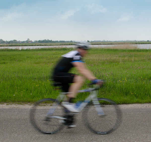 γρήγορη ποδηλάτης - Φωτογραφία, εικόνα