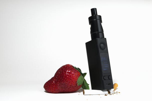 Electronic cigarette mashing a normal one - Photo, Image