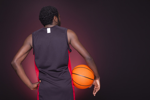 afro american basketball player holding a ball - Фото, зображення