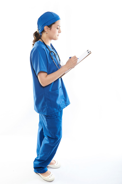 Nurse write on paper clip - Fotó, kép