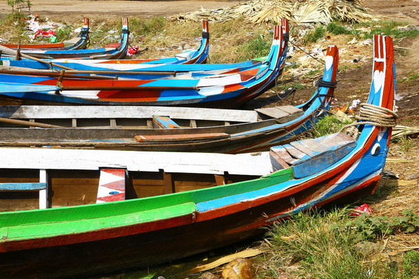 Multi colored boats on Irrawaddy river, Myanmar - Photo, Image