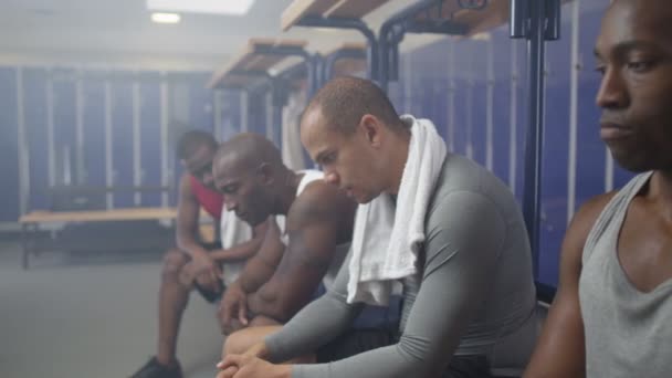 sports players reflecting on a losing game - Кадри, відео