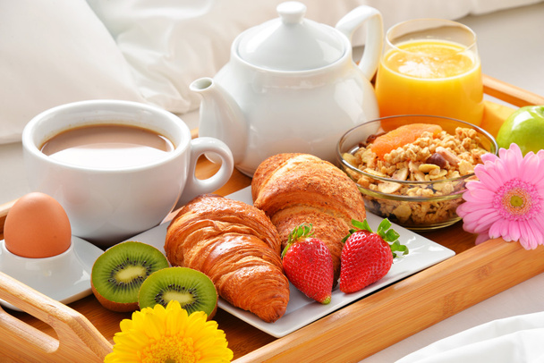 Breakfast tray in bed in hotel room - Photo, Image