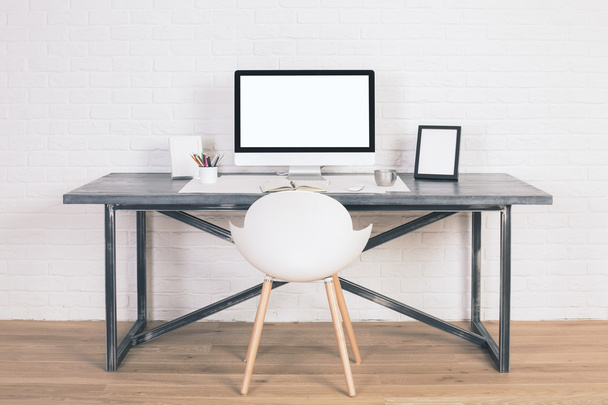 Desk with white monitor - Φωτογραφία, εικόνα
