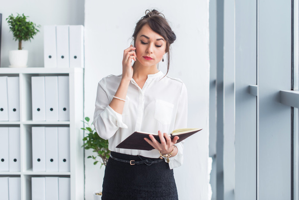 Portrait of a businesswoman having business call  - Photo, Image