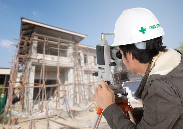 Engineers use tacheometer or theodolite with house construction  - Photo, Image