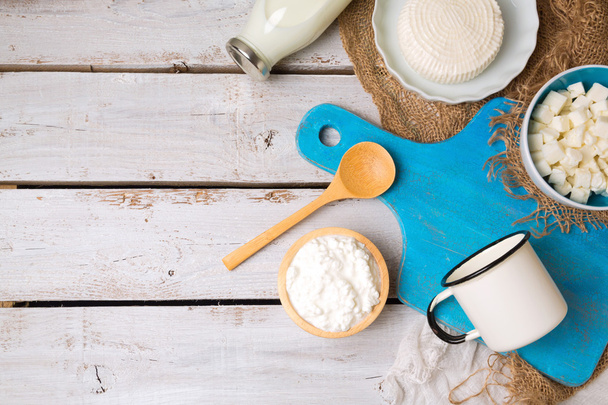 Milk and cottage cheese with cutting board - 写真・画像