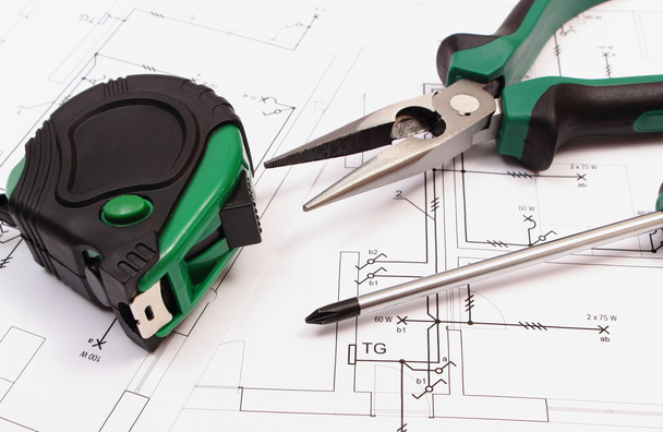 Work tools on electrical construction drawing of house - Photo, Image