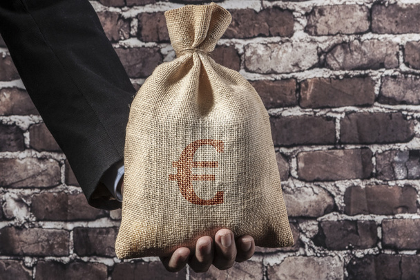 Červené Euro v ruce - Fotografie, Obrázek
