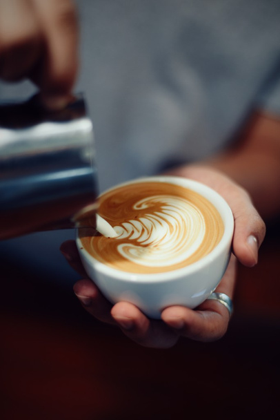 coffee latte art in coffee shop - Fotó, kép