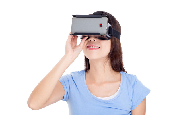 Mujer usando dispositivo de realidad virtual
 - Foto, Imagen