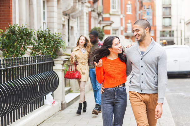 Multiracial group of friends walking in London - Foto, Imagen