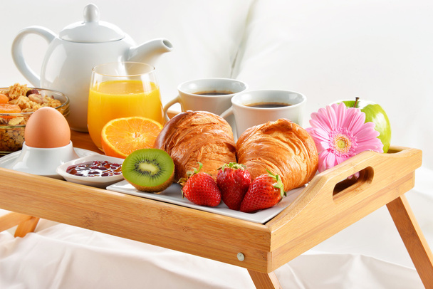 Breakfast tray in bed in hotel room - Photo, Image