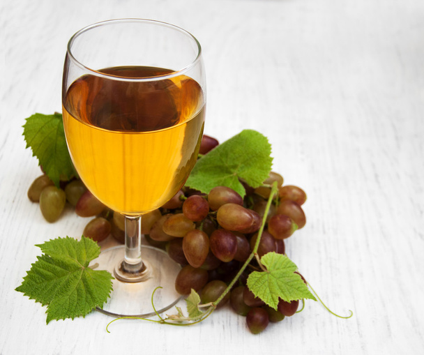 Glass with wine and white grape - Photo, image