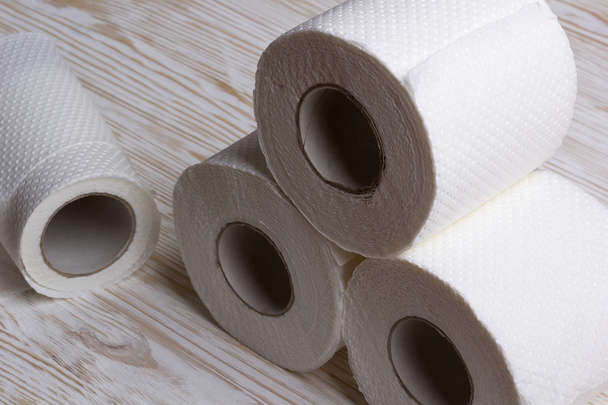Toilet paper on wooden board - Photo, Image