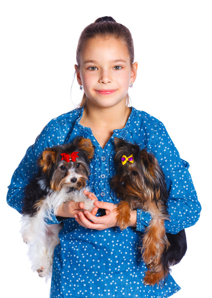 Girl playing with her yorkshire terrier - Fotó, kép