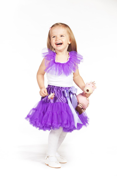 Little girl in a purple skirt - Fotoğraf, Görsel
