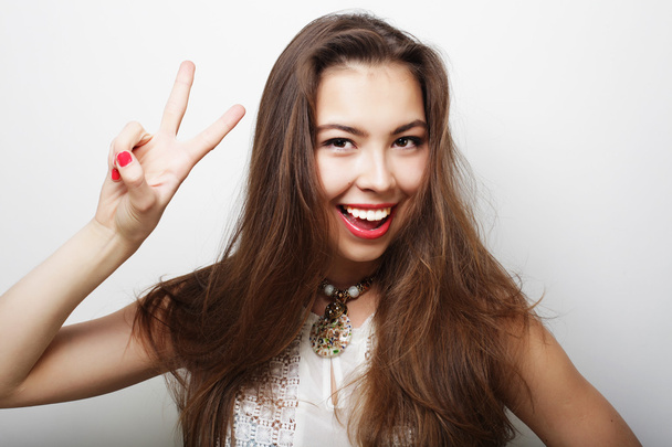 Successful girl gives thumb up with two hands - Foto, Imagen