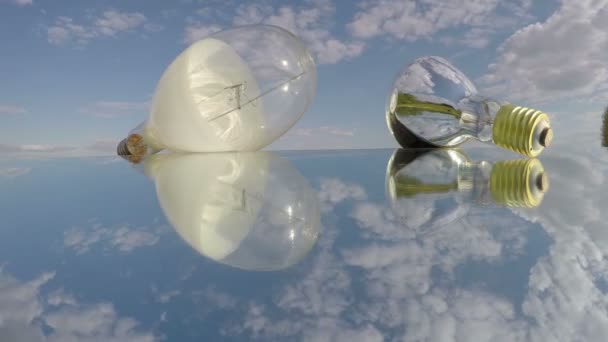 Two light bulbs on mirror, time lapse 4K - Footage, Video