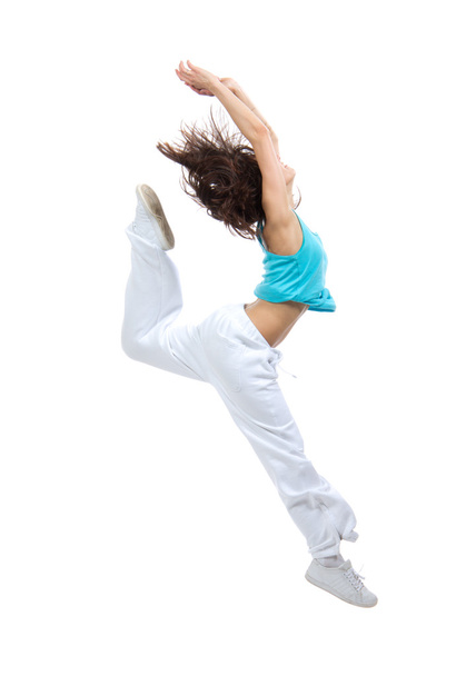 Slim hip-hop style teenage girl jumping dancing - Fotó, kép
