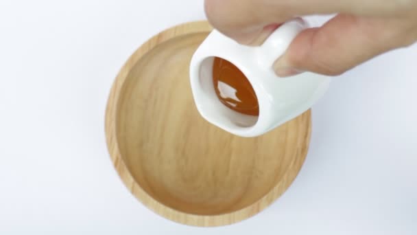 Gießen natürlicher Honig für gesunde Zutaten - Filmmaterial, Video