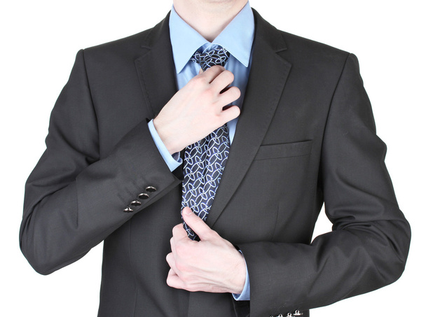 ネクタイを修正するビジネスマンをクローズ アップ - 写真・画像