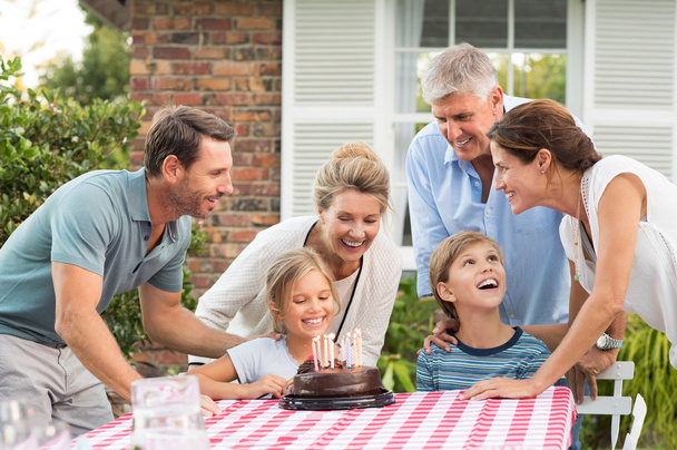 Family enjoying birthday party - Фото, изображение