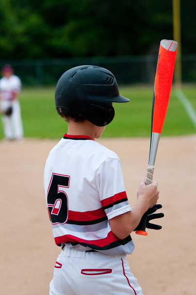 Közelkép az amerikai baseball fiú mögül. - Fotó, kép