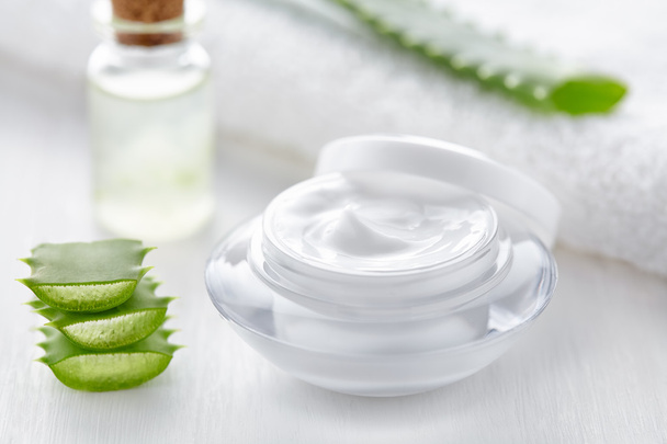 Aloe vera cosmetic cream, herb slices, skin face body care - Photo, Image